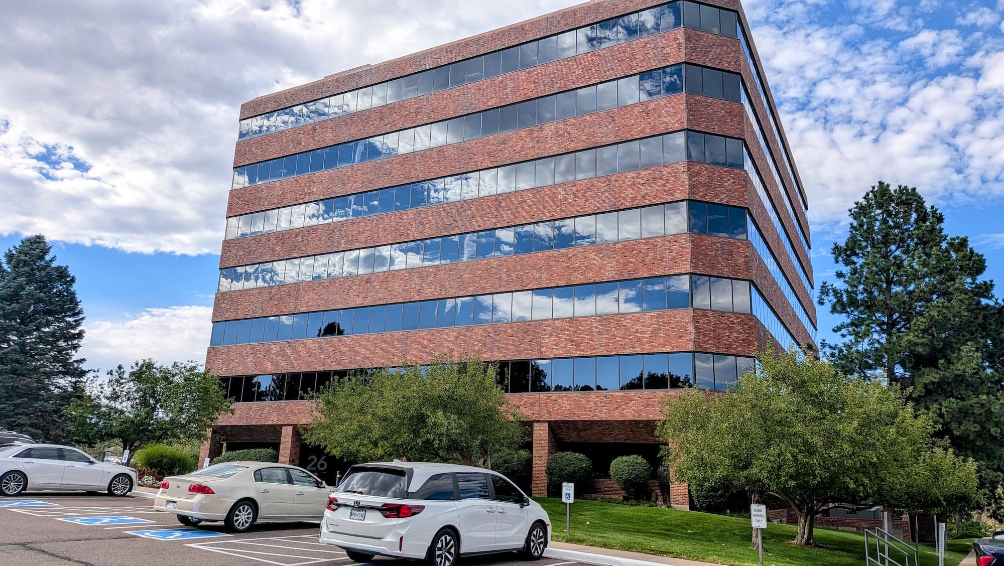 The Kellogg Center at 26 W Dry Creek Cir in Littleton — home of the Reflective Financial office